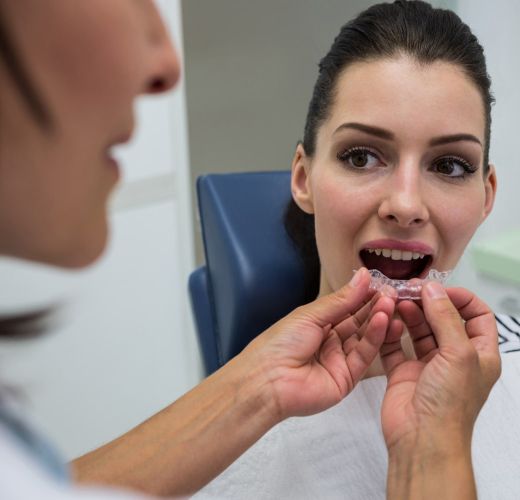 A woman using retainer repair