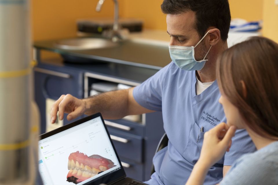 Orthodontist with patient